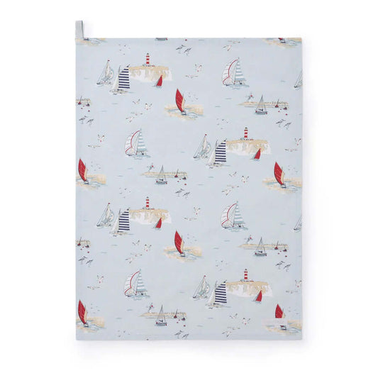 Sophie Allport "Coastal Boats" Tea Towel featuring nautical drawings of boats on a pale blue background.